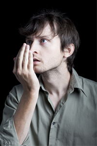 Man Checking his Breath